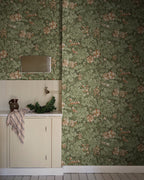 Tyra wallpaper by Sandberg in Forest Green, styled in a room, view 2