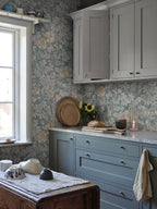 Tyra wallpaper by Sandberg in Misty Blue, styled on an interior wall