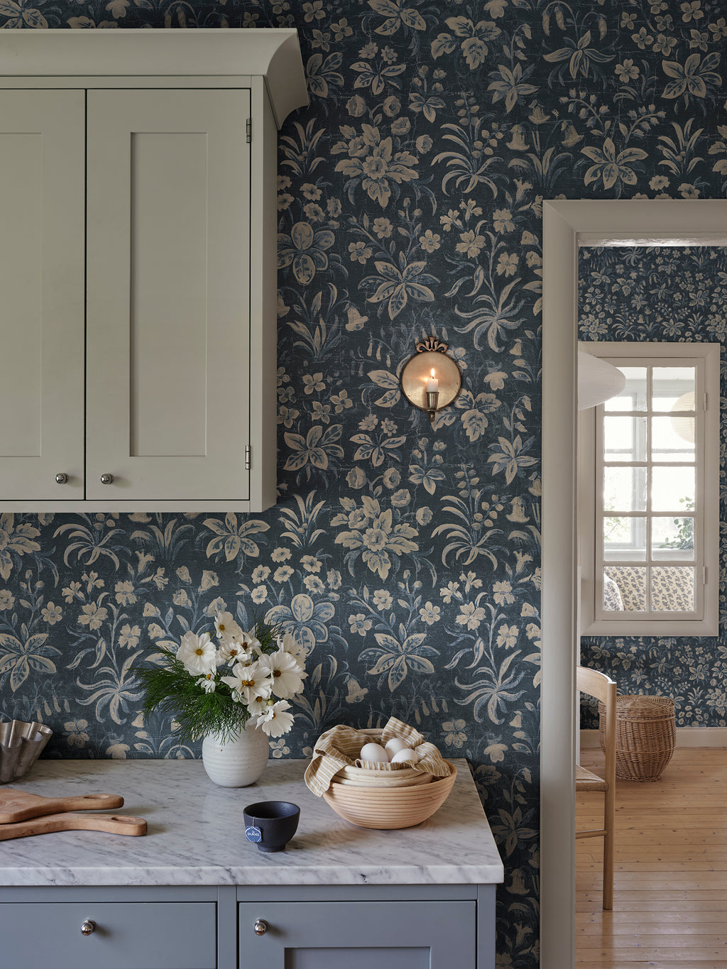 Ania wallpaper by Sandberg in Midnight Blue, styled on an interior wall