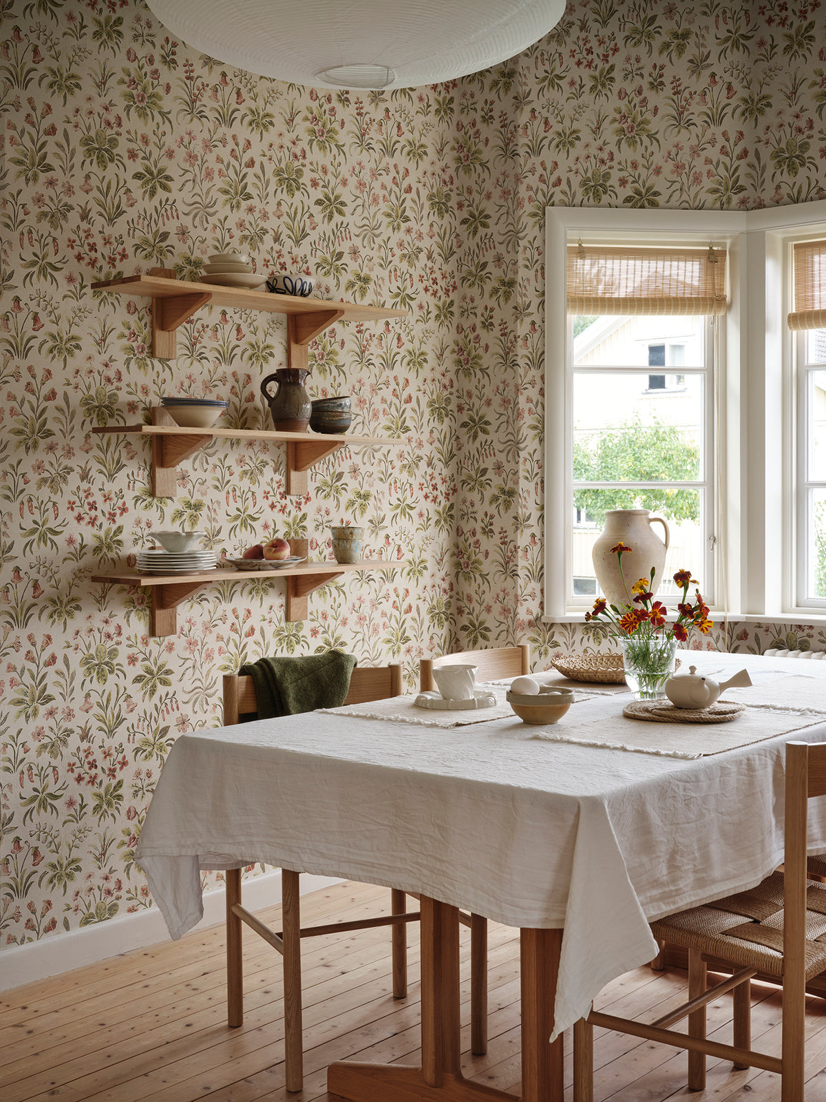 Ania wallpaper by Sandberg in Oat, styled on an interior wall