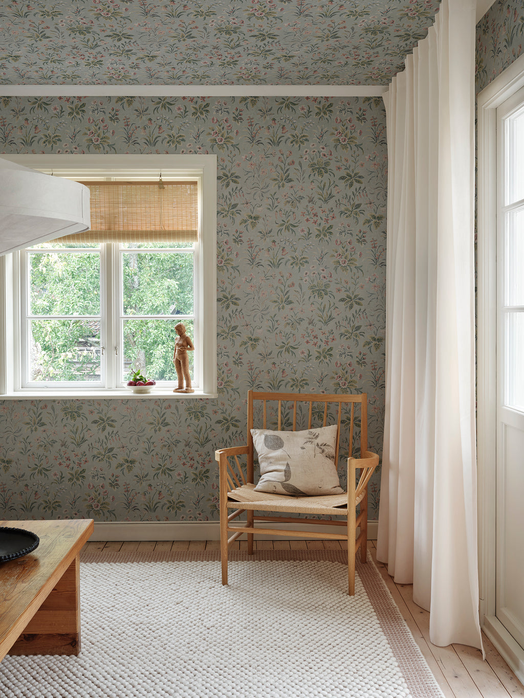 Ania wallpaper by Sandberg in Misty Blue, styled in a room, view 2