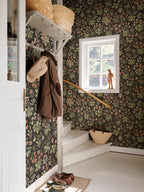 Ania wallpaper by Sandberg in Charcoal, styled on an interior wall