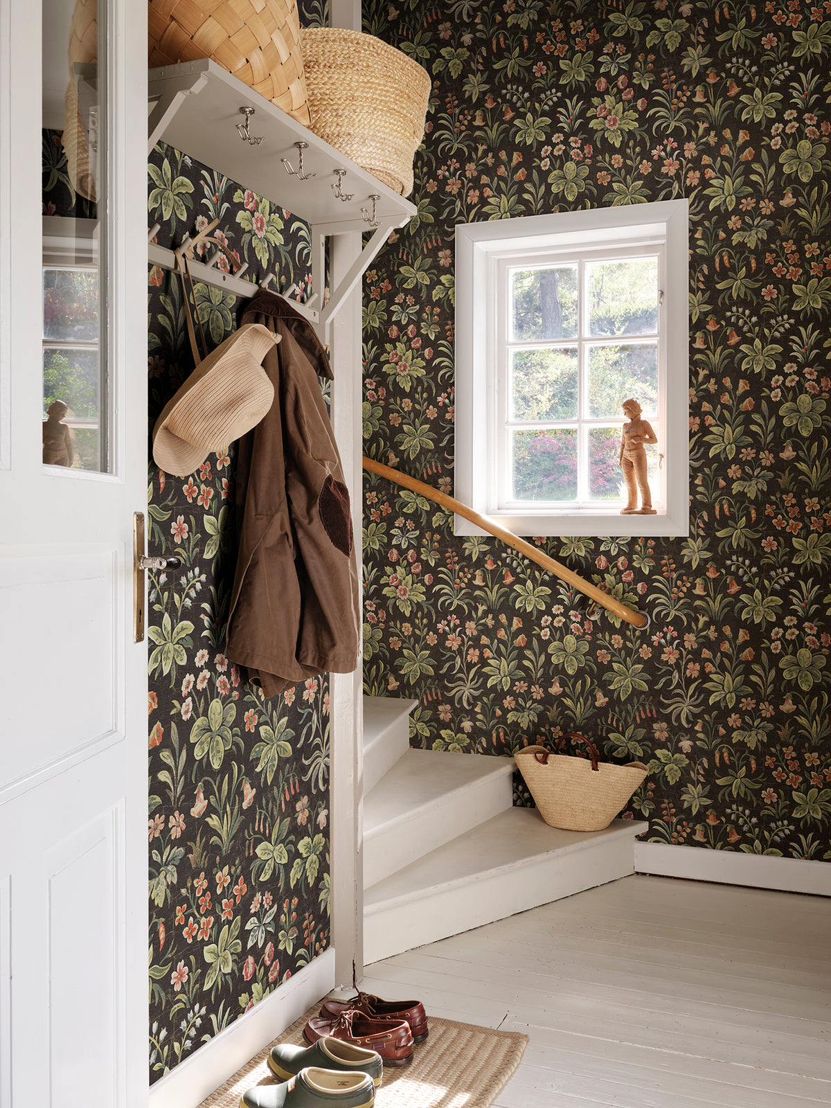 Ania wallpaper by Sandberg in Charcoal, styled on an interior wall