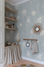 Poppy wallpaper by Sandberg in Light Blue, styled on an interior wall