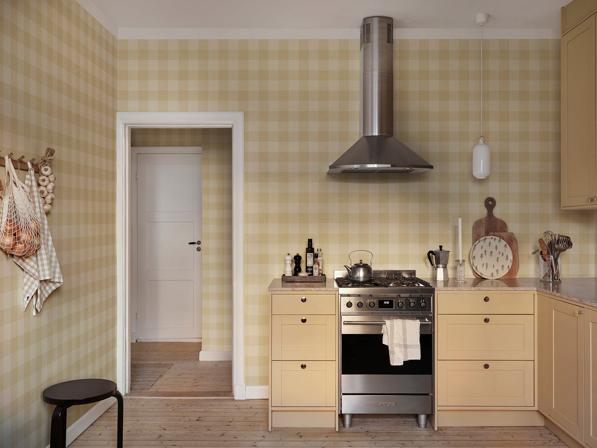 Lykke wallpaper by Sandberg in Yellow, styled on an interior wall