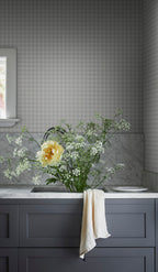 Herman wallpaper by Sandberg in Misty Blue, styled on an interior wall