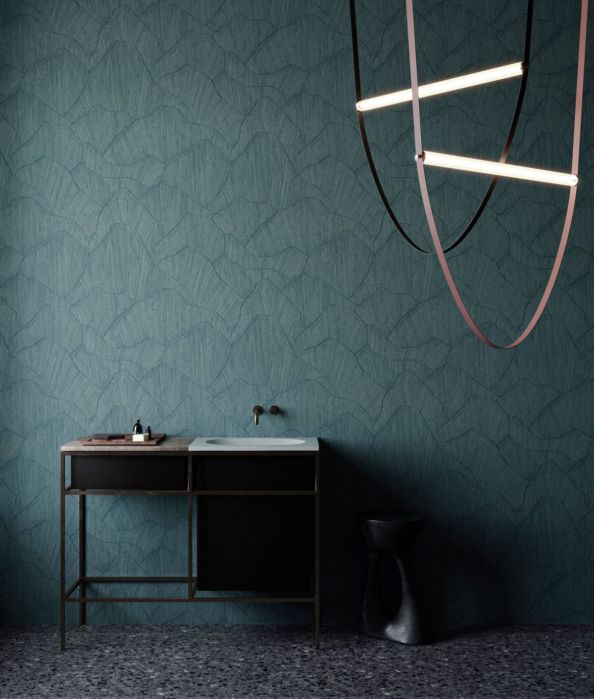 Shards wallpaper by Arte in Teal behind a black console and a sculptural pendant light