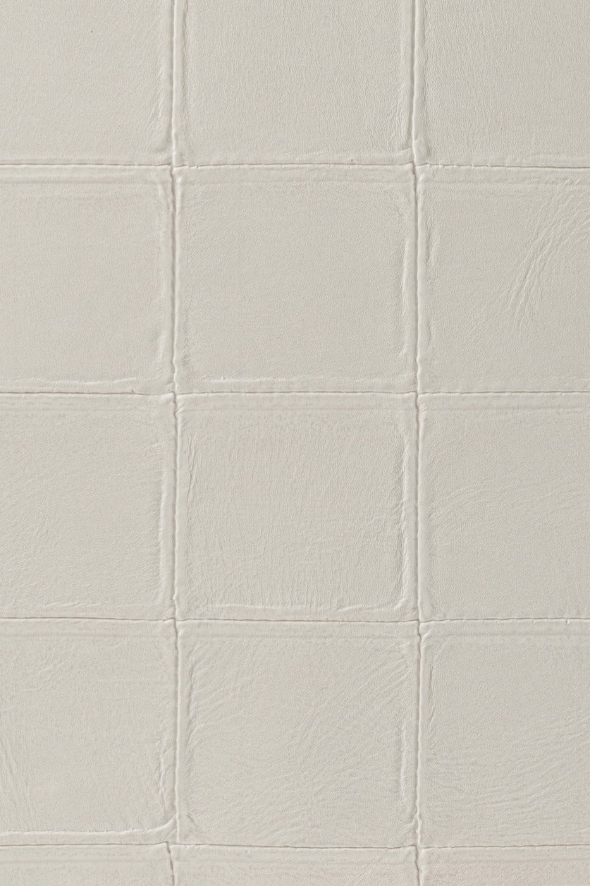 Alma by Arte wallpaper by Arte in Beige (Eggshell) – flat swatch of the padded leather pattern