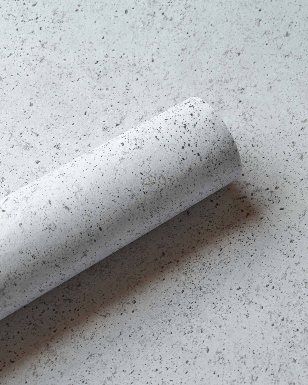 Ciment wallpaper by Coordonné in Grey – Glacier, roll close-up