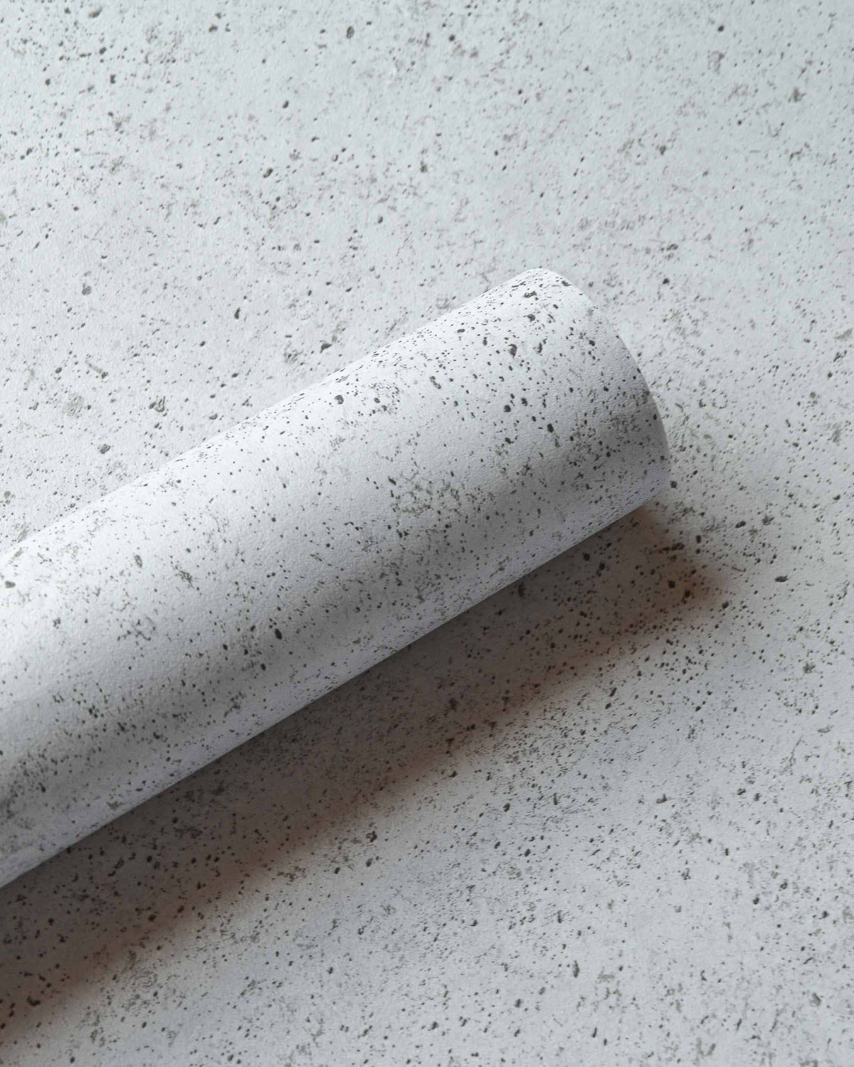 Ciment wallpaper by Coordonné in Grey – Glacier, roll close-up