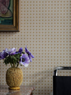 Classic Rattan wallpaper by Långelid/von Brömssen in Gold, styled room shot