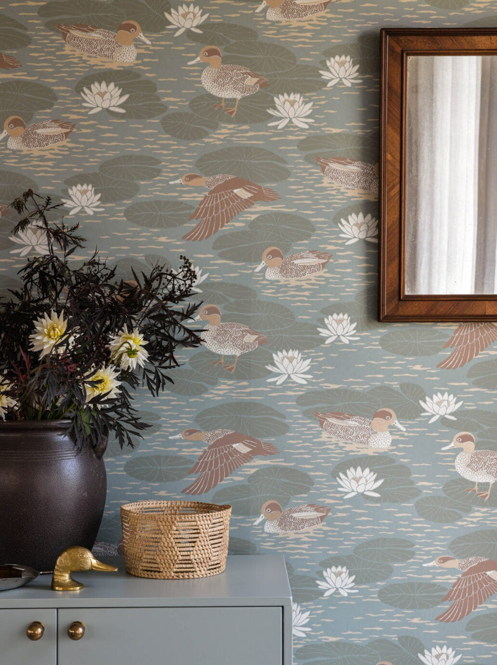 Duck Pond wallpaper by Långelid/von Brömssen in Teal, styled room shot 2