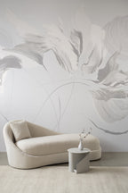 Aurora wallpaper by Emma Hayes in dawn, oversized painterly bloom in soft cream tones above a curved chaise