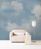 Dispersion wall mural by Emma Hayes in Sky, soft blue watercolour sky with drifting white clouds