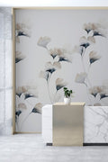Gingko Mural wall mural by Emma Hayes in shadow grey and charcoal, inky watercolour ginkgo leaves on a pale ground behind a marble counter