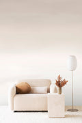 Stratum ombre wall mural by Emma Hayes in barely-there warm blush cream, styled in a soft neutral living room