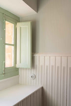 Fermín wallpaper by Coordonné in Green – Pistachio, styled room