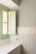 Fermín wallpaper by Coordonné in Green – Celadon, styled room