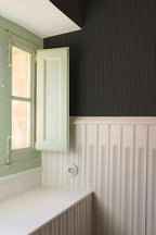 Fermín wallpaper by Coordonné in Black, styled room