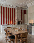 Florentine Stripe wallpaper by Coordonné in Red, styled room