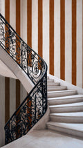 Florentine Stripe wallpaper by Coordonné in Brown, styled room