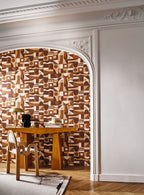 Gourna wallpaper by Casamance in Orange – Terracotta & Copper, styled room shot