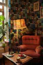 Harry Potter Hogwarts Library Bookshelf wallpaper mural on the wall of a reading nook with a pink velvet armchair