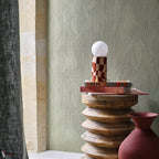 Jassine wallpaper by Casamance in Green – Almond, styled room shot