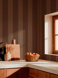 Palmeral wallpaper by Coordonné in Brown, styled room