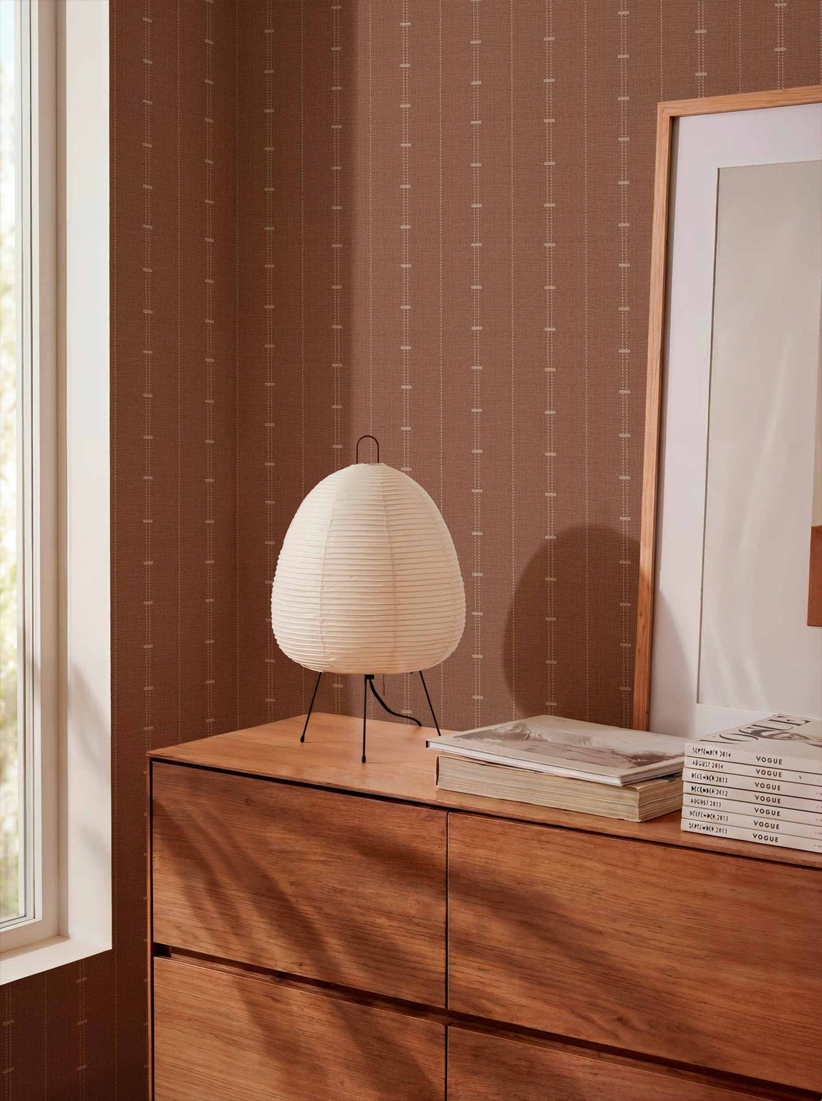 Raíces wallpaper by Coordonné in Orange, styled room