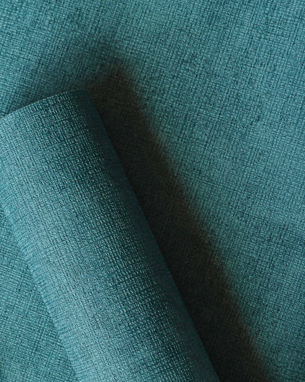 Raphia wallpaper by Coordonné in Teal, roll close-up