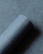 Raphia wallpaper by Coordonné in Blue, roll close-up