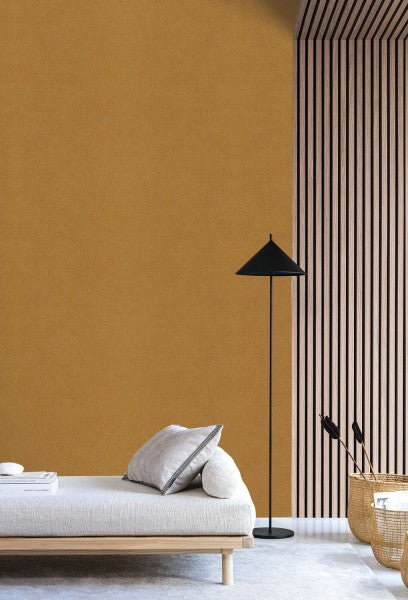 Rhodium wallpaper by Casamance in Yellow – Ochre, styled room shot