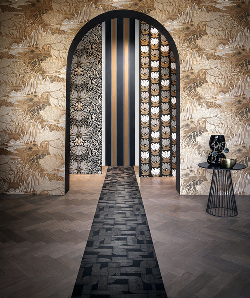 Auteuil Stripe Black wallpaper by Casamance styled in an arched hallway alongside coordinating patterned papers
