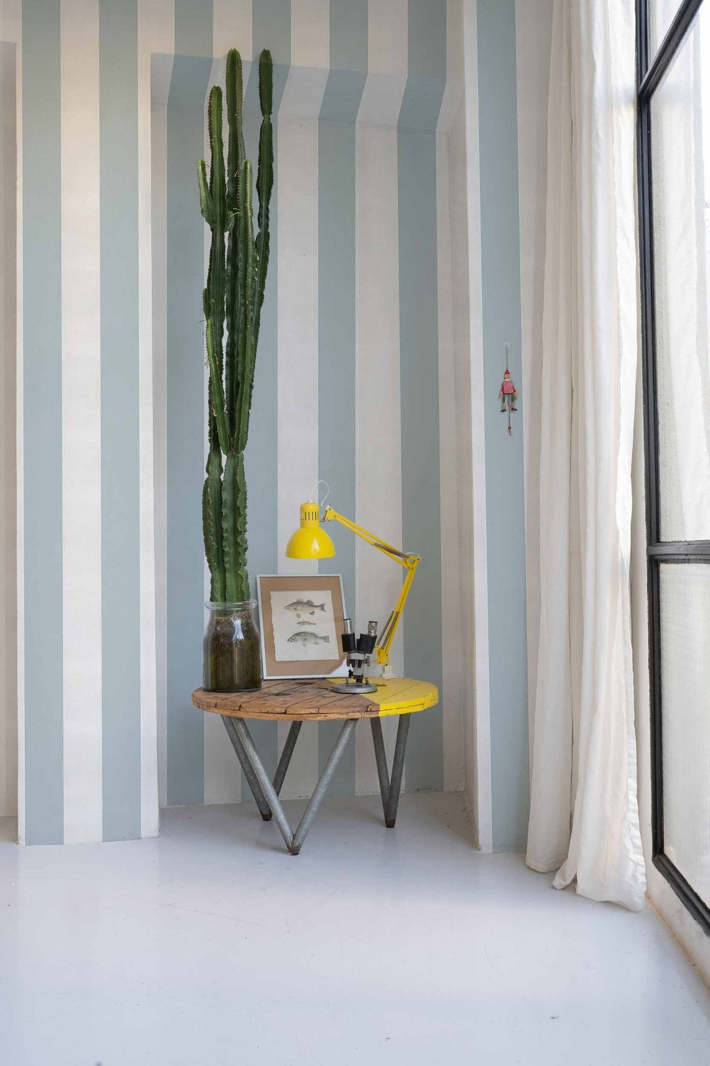 Stripe 8 wallpaper by Coordonné in Blue, styled room