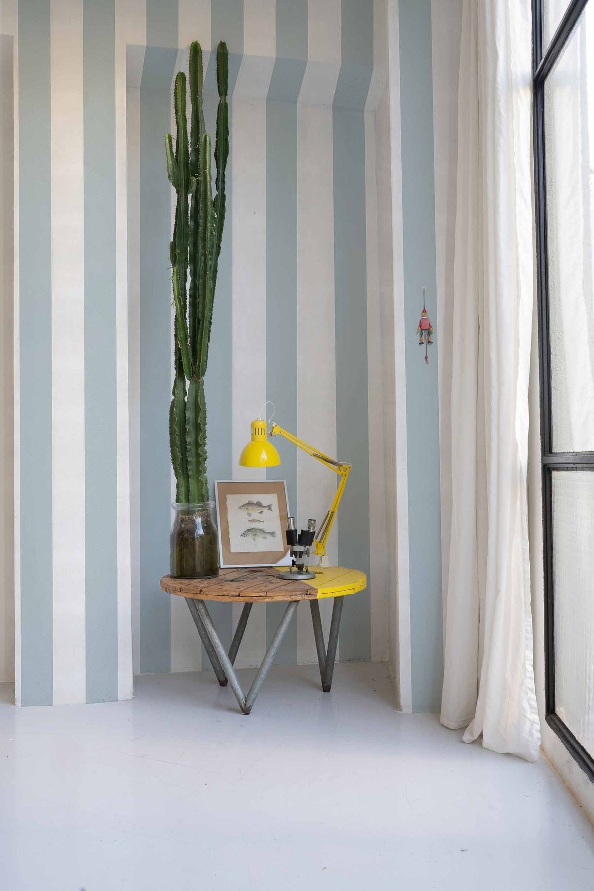 Stripe 8 wallpaper by Coordonné in Blue, styled room
