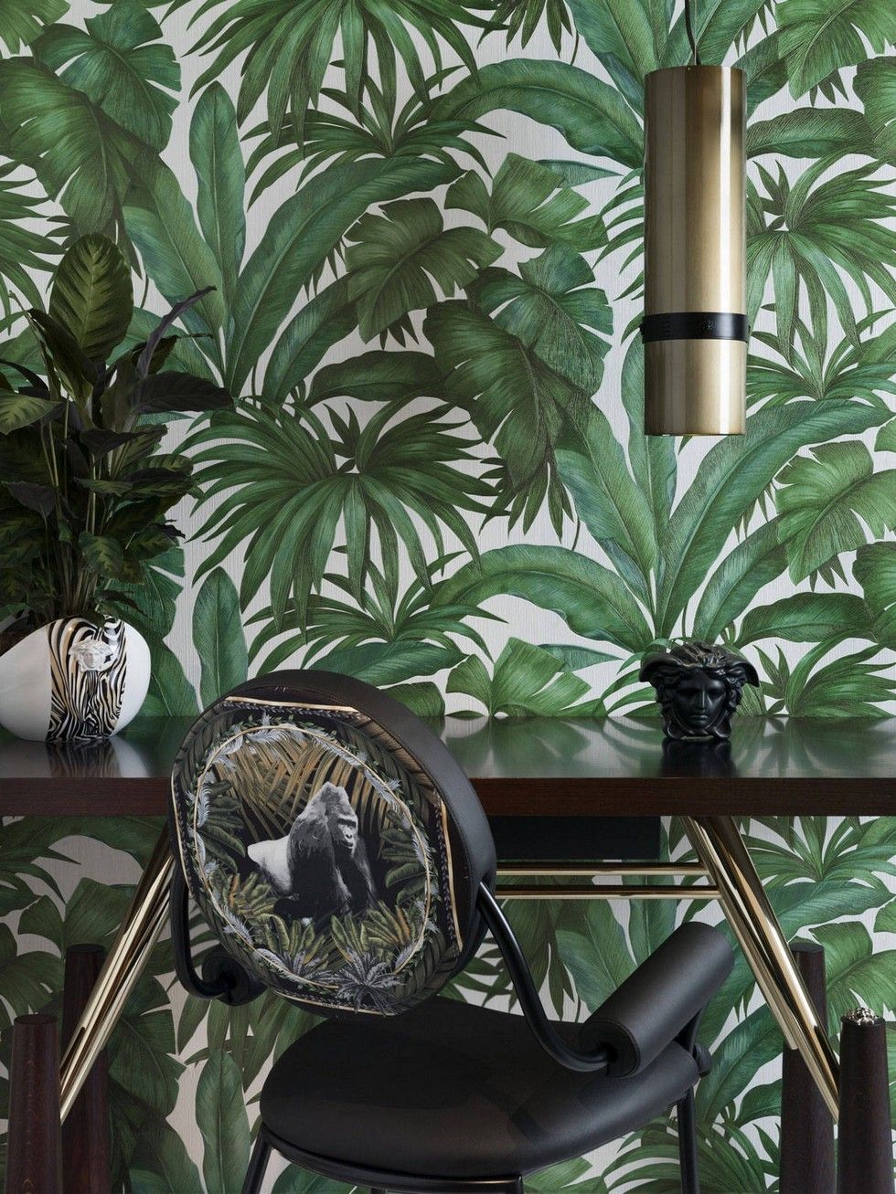 Versace tropical palm wallpaper features large scale hand painted green tropical palm leaves on a white background perfect for study or bedroom wallpaper