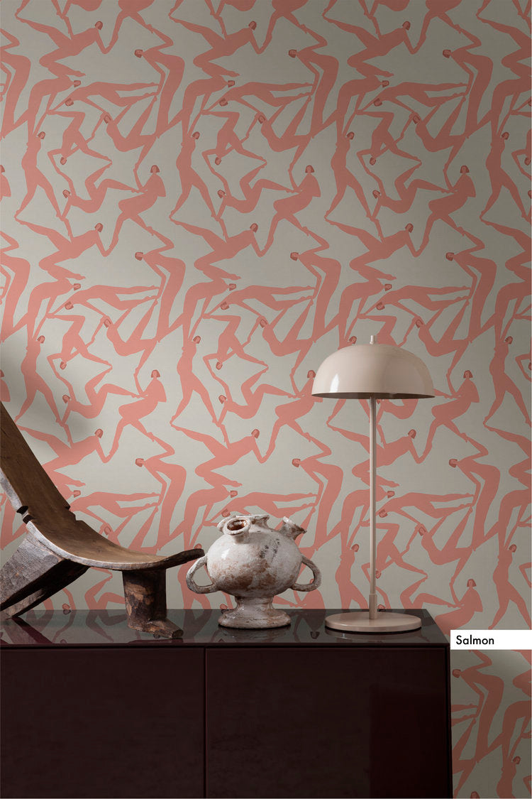 Laura Berger Wallpaper, features dancing figures in a pattern to create a create in salmon pink